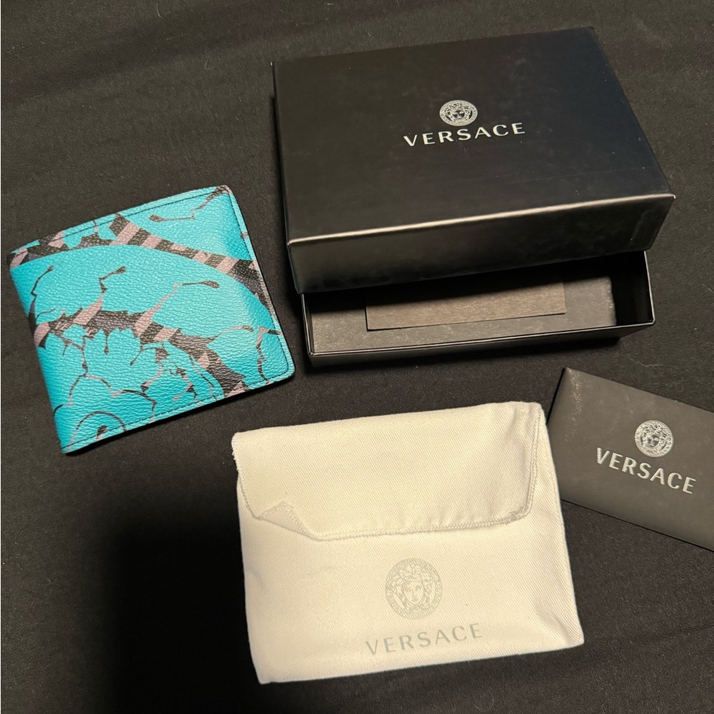 Versace blue multicolor leather La Greca bifold wallet.